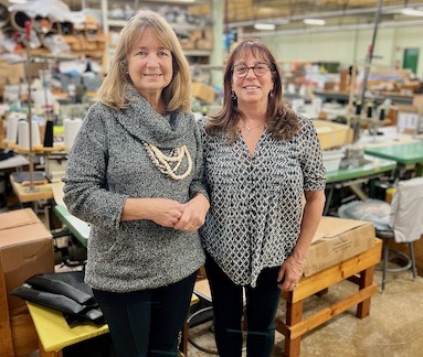 Pam, CEO of company that sews BraLisa and Lisa B. on the sewing shop floor